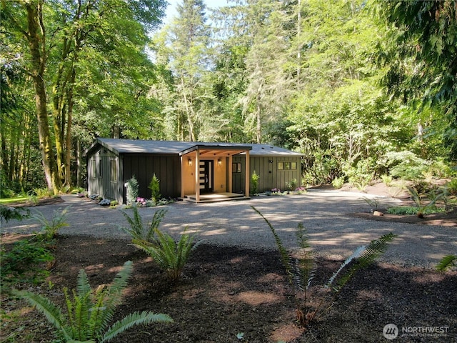 1524 Toe Jam Hill Rd NE, Bainbridge Island, WA 98110 - garage with a forest view