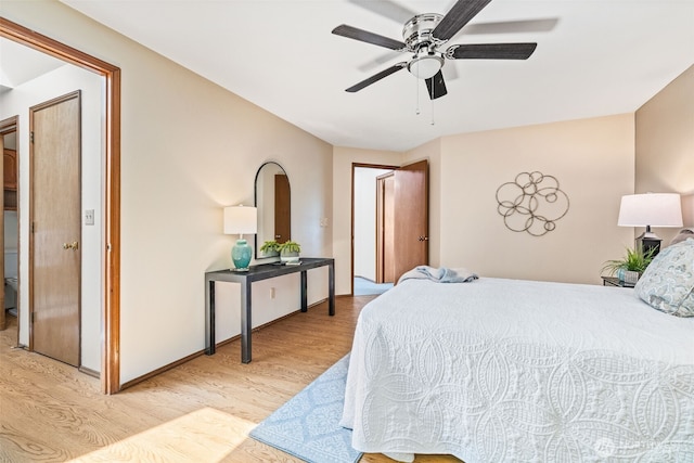 5040 Mill Pond Loop SE, Auburn, WA 98092 - bedroom featuring light wood finished floors and ceiling fan
