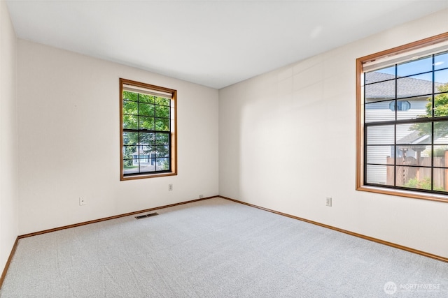 5040 Mill Pond Loop SE, Auburn, WA 98092 - spare room with carpet and baseboards