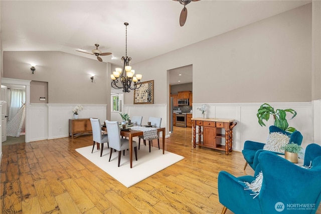 4119 72nd St E, Tacoma, WA 98443 - dining room with a ceiling fan, wainscoting, light wood-type flooring, a chandelier, and lofted ceiling