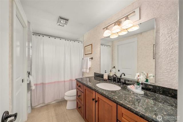 4119 72nd St E, Tacoma, WA 98443 - bathroom with vanity, shower / tub combo, tile patterned floors, and wallpapered walls