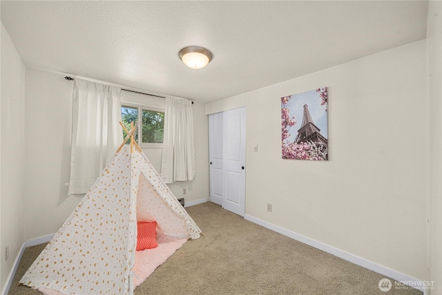 4119 72nd St E, Tacoma, WA 98443 - rec room featuring carpet and a textured ceiling
