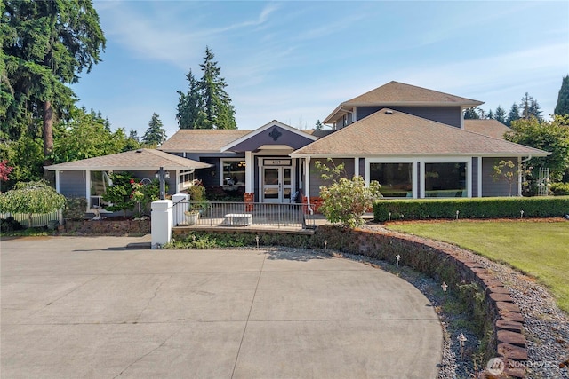 4119 72nd St E, Tacoma, WA 98443 - view of front of property featuring a front lawn and roof with shingles