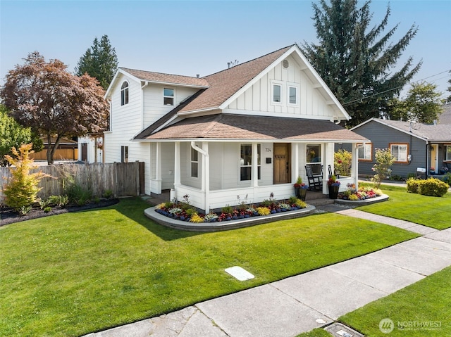 724 6th Ave SW, Puyallup, WA 98371 - view of front of house featuring board and batten siding, a porch, and roof with shingles