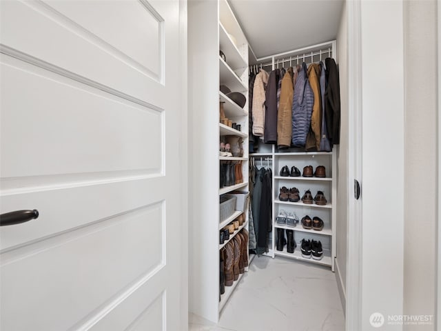 724 6th Ave SW, Puyallup, WA 98371 - walk in closet featuring marble finish floors