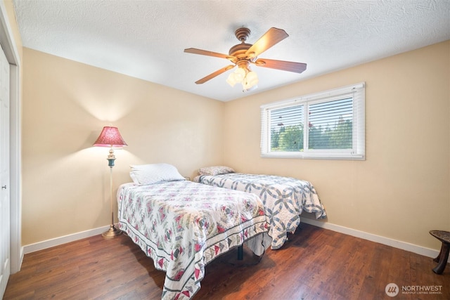 3109 NW 151st St, Vancouver, WA 98685 - bedroom with wood finished floors, a closet, and a ceiling fan