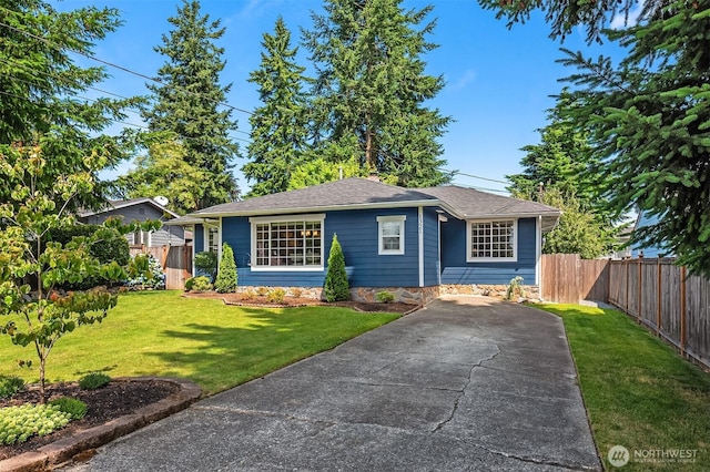 1321 Kossuth Ave, Everett, WA 98203 - view of front of home with roof with shingles and concrete driveway