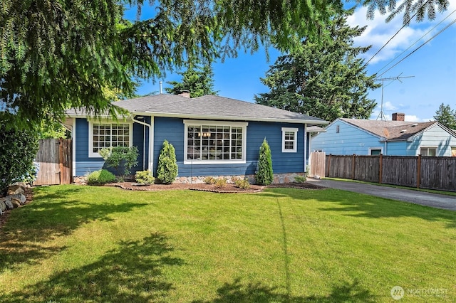 1321 Kossuth Ave, Everett, WA 98203 - view of front facade featuring a chimney and driveway