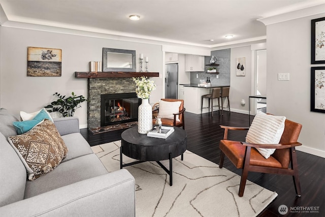 1321 Kossuth Ave, Everett, WA 98203 - living area with wood finished floors, a fireplace, and recessed lighting