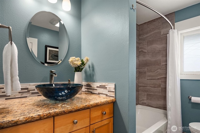 1321 Kossuth Ave, Everett, WA 98203 - bathroom featuring vanity, shower / bathtub combination with curtain, and tasteful backsplash