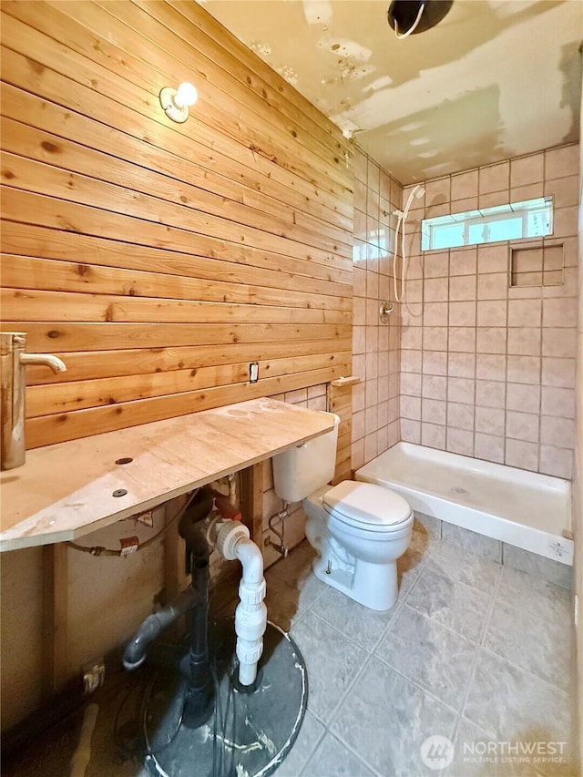 11422 Leschi Cir, Anderson Island, WA 98303 - full bathroom with tiled shower, tile patterned flooring, and wooden walls