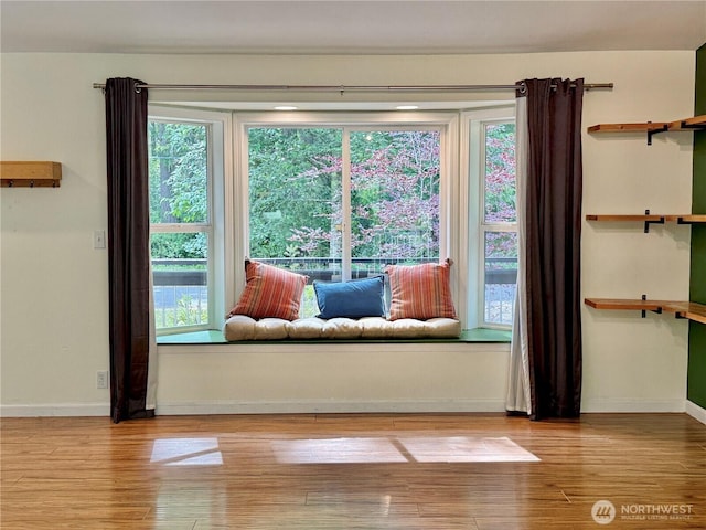 11422 Leschi Cir, Anderson Island, WA 98303 - sitting room featuring healthy amount of natural light and wood finished floors