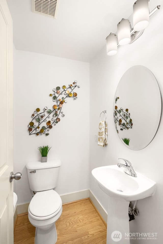 18223 NE 95th Way Unit 102, Redmond, WA 98052 - bathroom featuring wood finished floors