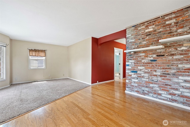 406 4th St NE, Puyallup, WA 98372 - unfurnished room featuring wood finished floors and baseboards