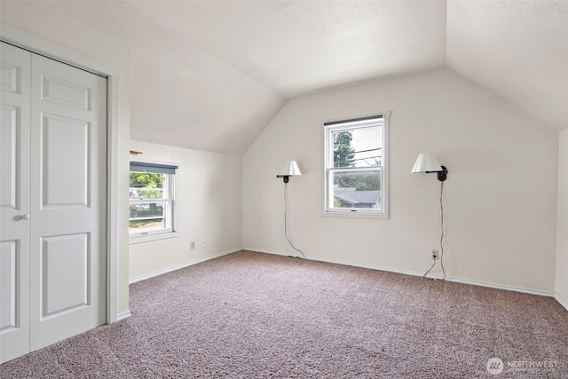406 4th St NE, Puyallup, WA 98372 - additional living space with carpet flooring and lofted ceiling
