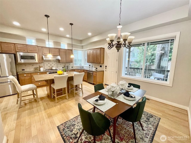 6802 156th Pl NE, Redmond, WA 98052 - dining room featuring a chandelier, light wood finished floors, and recessed lighting