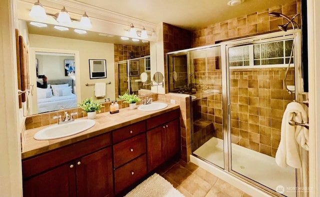 6802 156th Pl NE, Redmond, WA 98052 - bathroom with ensuite bath, tile patterned floors, double vanity, and a shower stall