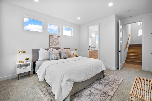 2009B Dexter Ave N, Seattle, WA 98109 - bedroom with recessed lighting, light colored carpet, and connected bathroom