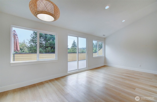 1611 NE 113th St Unit 421, Vancouver, WA 98686 - unfurnished room featuring light wood-style floors, lofted ceiling, and recessed lighting
