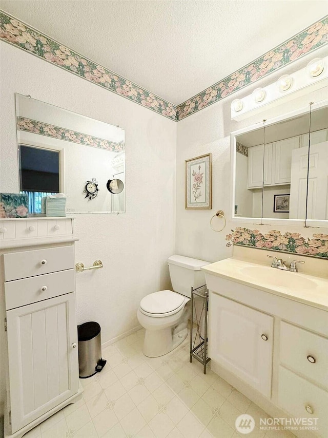 4905 US Highway 12, Elma, WA 98541 - bathroom featuring vanity and a textured ceiling