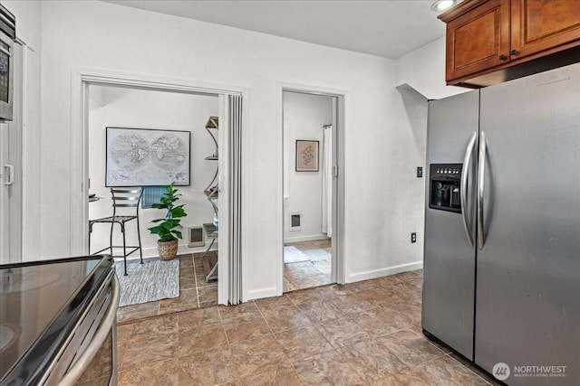 820 S Ferry St, Tacoma, WA 98405 - kitchen with stainless steel appliances and brown cabinets