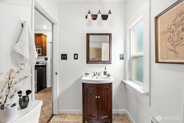 820 S Ferry St, Tacoma, WA 98405 - full bath featuring vanity and baseboards