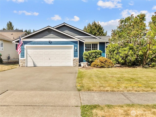 839 Avalon Ct SE, Olympia, WA 98513 - ranch-style home featuring a garage, stone siding, concrete driveway, and a front yard