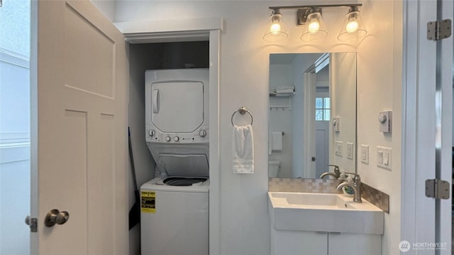 890 Magellan Ave NE Unit 3, Ocean Shores, WA 98569 - bathroom with stacked washing machine and dryer and vanity