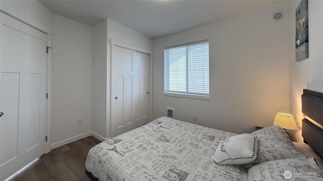 890 Magellan Ave NE Unit 3, Ocean Shores, WA 98569 - bedroom with dark wood-type flooring and a closet