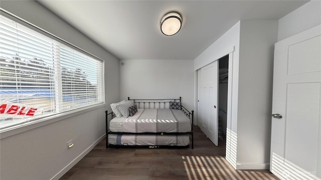 890 Magellan Ave NE Unit 3, Ocean Shores, WA 98569 - bedroom featuring wood finished floors and a closet