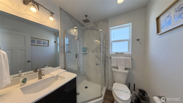 890 Magellan Ave NE Unit 3, Ocean Shores, WA 98569 - bathroom featuring vanity and a marble finish shower