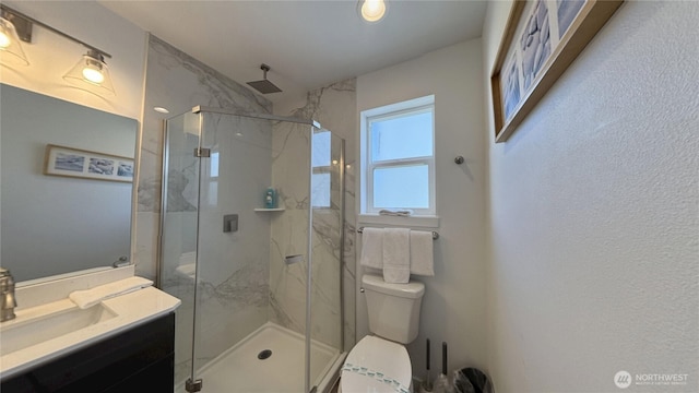 890 Magellan Ave NE Unit 3, Ocean Shores, WA 98569 - bathroom featuring vanity and a marble finish shower