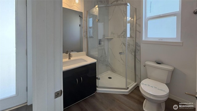 890 Magellan Ave NE Unit 3, Ocean Shores, WA 98569 - bathroom with vanity, a marble finish shower, and wood finished floors