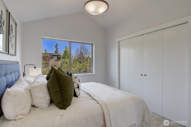 5929 California Ave SW Unit B, Seattle, WA 98136 - carpeted bedroom with lofted ceiling and a closet