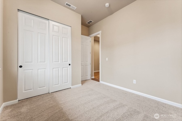 5801 SW Thornhill Ave SW Unit 323, Port Orchard, WA 98367 - unfurnished bedroom with carpet flooring and a closet