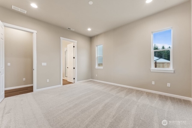 5801 SW Thornhill Ave SW Unit 323, Port Orchard, WA 98367 - unfurnished bedroom with carpet floors, recessed lighting, and multiple windows