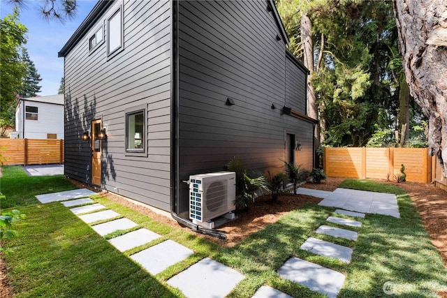 826 NE 95th St, Seattle, WA 98115 - view of property exterior with an ac unit and a fenced backyard
