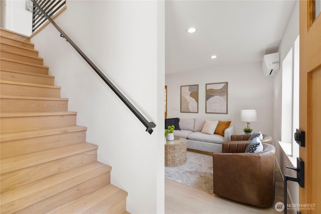 826 NE 95th St, Seattle, WA 98115 - living area featuring stairs, a wall unit AC, recessed lighting, and wood finished floors