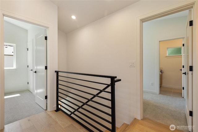 826 NE 95th St, Seattle, WA 98115 - hall featuring an upstairs landing, light wood finished floors, light colored carpet, and recessed lighting