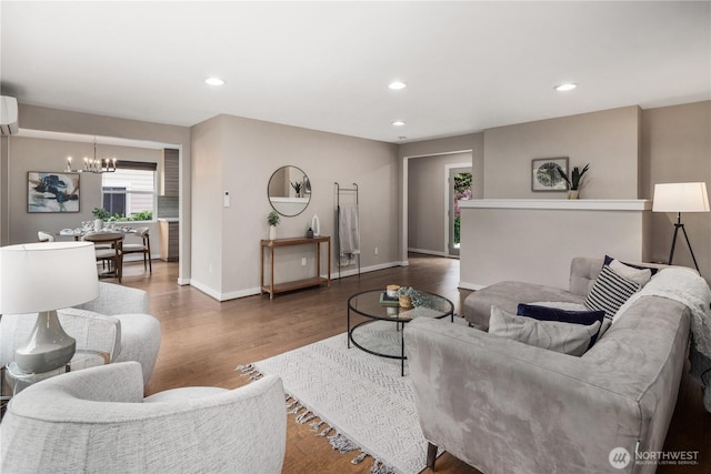 1600 11th Ave S, Seattle, WA 98134 - living area featuring a chandelier, wood finished floors, recessed lighting, and a wall mounted AC