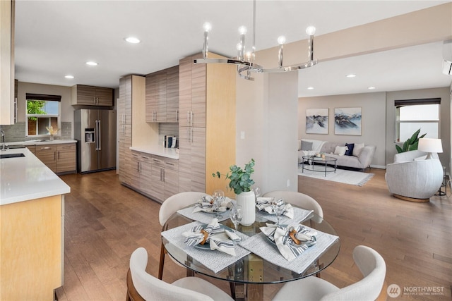 1600 11th Ave S, Seattle, WA 98134 - dining room featuring wood finished floors, recessed lighting, and a wall unit AC