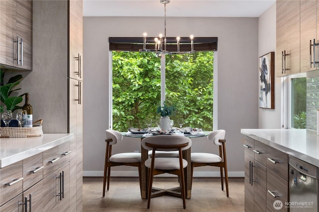 1600 11th Ave S, Seattle, WA 98134 - dining space featuring light wood-style floors and a chandelier