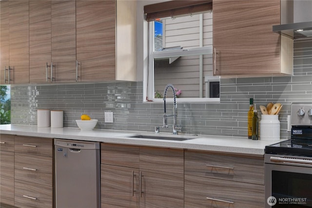 1600 11th Ave S, Seattle, WA 98134 - kitchen featuring stainless steel appliances, modern cabinets, and brown cabinets