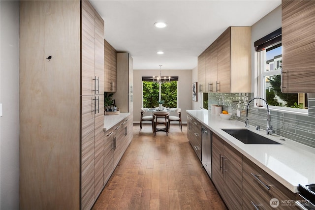 1600 11th Ave S, Seattle, WA 98134 - kitchen with dark wood finished floors, decorative backsplash, light countertops, dishwasher, and recessed lighting