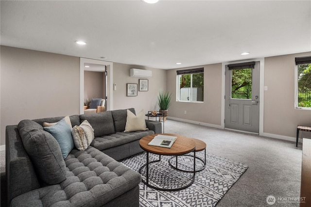 1600 11th Ave S, Seattle, WA 98134 - living room with a wall mounted air conditioner, recessed lighting, and light carpet
