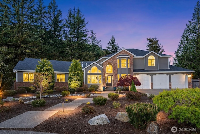 43936 SE 127th Pl, North Bend, WA 98045 - view of front of property featuring a garage and brick siding