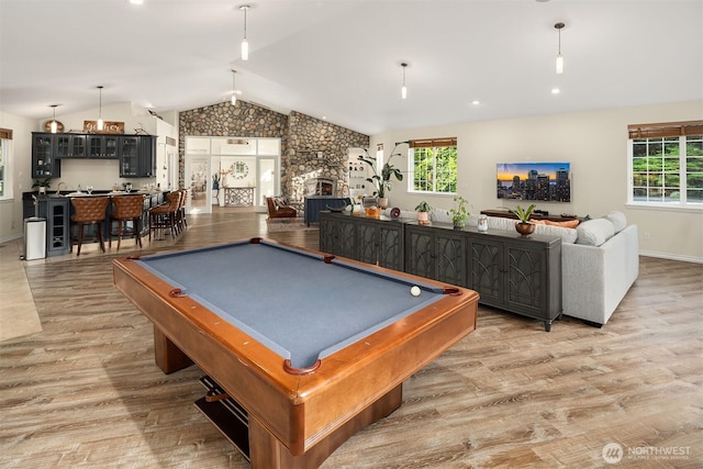 43936 SE 127th Pl, North Bend, WA 98045 - game room with vaulted ceiling, light wood finished floors, healthy amount of natural light, and billiards