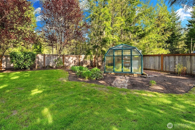 43936 SE 127th Pl, North Bend, WA 98045 - fenced backyard featuring a greenhouse and an outdoor structure