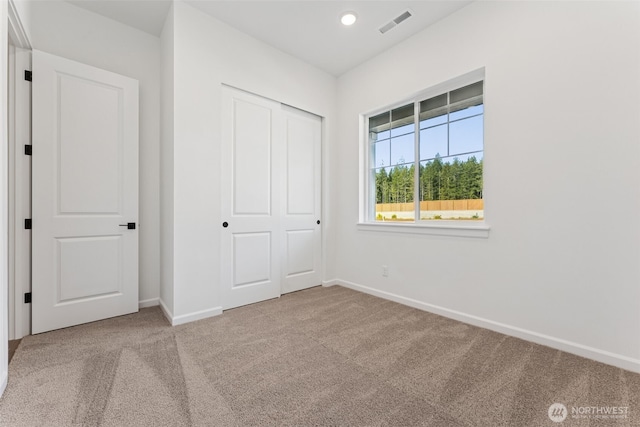 5781 SW Thornhill Ave SW Unit 324, Port Orchard, WA 98367 - unfurnished bedroom featuring carpet, a closet, and recessed lighting