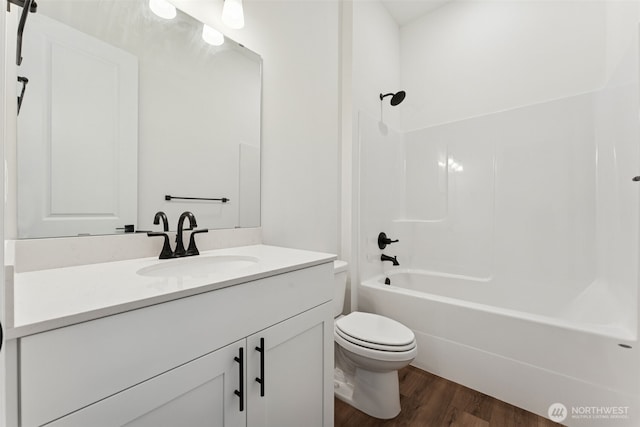 5781 SW Thornhill Ave SW Unit 324, Port Orchard, WA 98367 - full bath featuring wood finished floors, vanity, and shower / tub combination